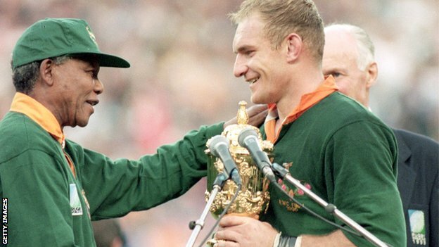Mandela handing over the World Cup trophy